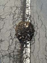 Schlagloch Strassenmitte Stammheimer Ring 76